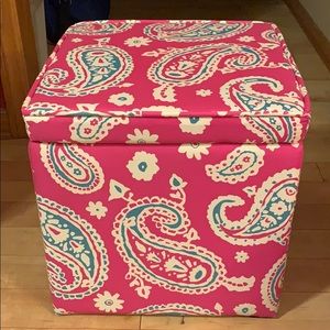 Tufted pink and teal fabric ottoman